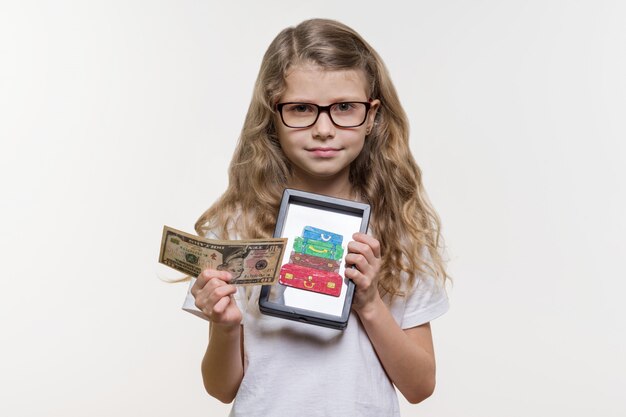 meisje met geld en tablet