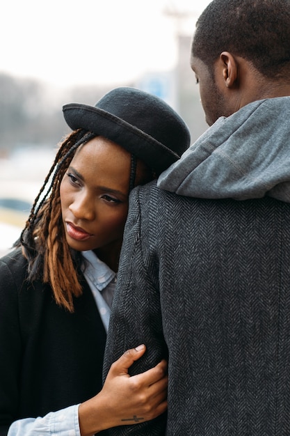 Melancholic mood. African American couple. Strong love connection, young fashionable people, unrecognizable black male, parting and break up concept