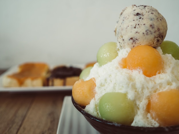 Melon Patbingsu with ice-creamed on top.