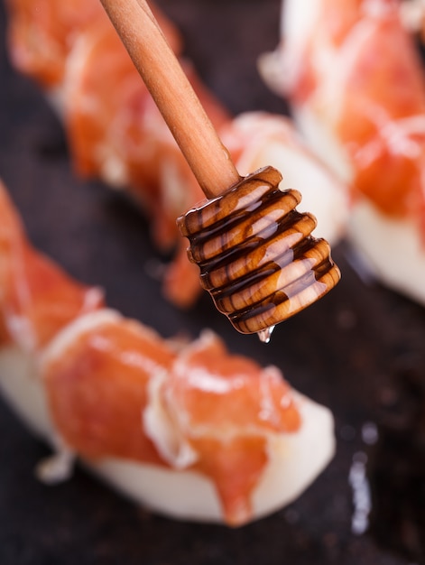 Melon with Serrano ham.Summer salad for parties.