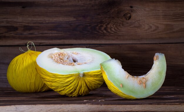 Melon on a wooden background