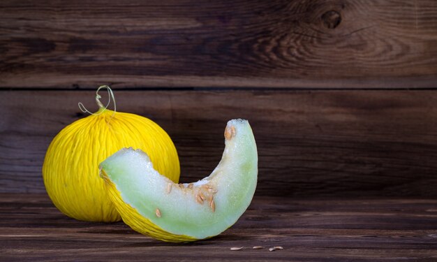 Melon on a wooden background