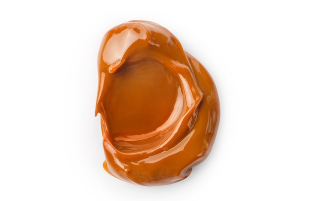 Melted caramel isolated on white
