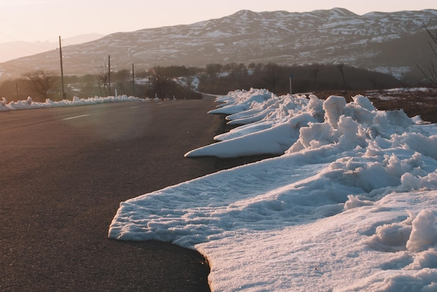 Melting snow by the road