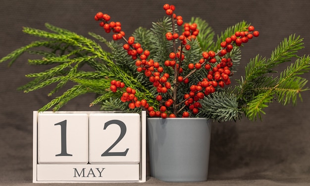 Photo memory and important date may 12, desk calendar - spring season.