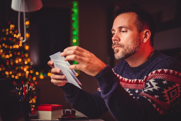 Men cheeking his mail late night