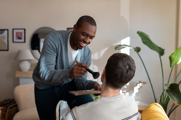 Men doing makeup