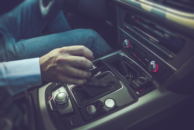 Men Driving the Car