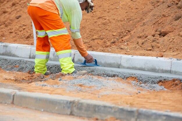 Men and machinery working on road works