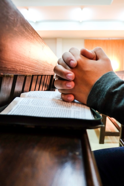 Men praying in church.