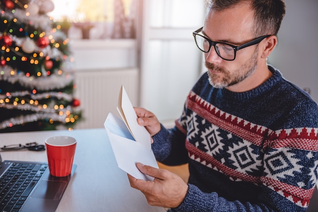 Men preparing greeting card