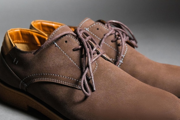 Men's brown leather laceup shoes with orange leather interior