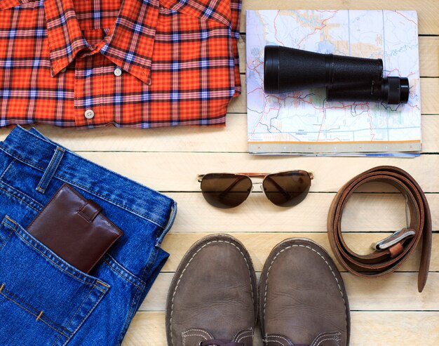 Men's casual outfits with man clothing, travel preparations and accessories