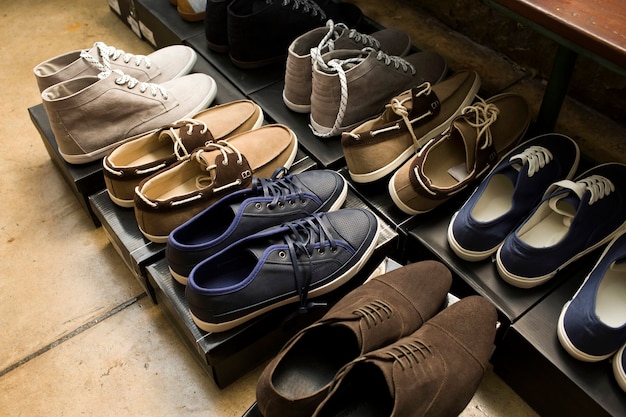 men's fashion shoes on boxes