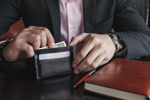 Men's hand wallet in the pocket