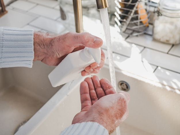 Men's hands and a bar of soap