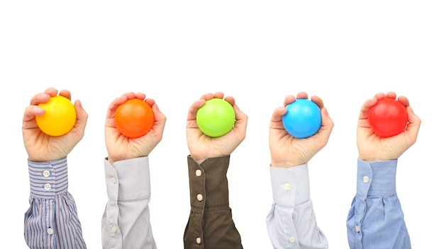 Photo men's hands with colorful plastic balls on white background