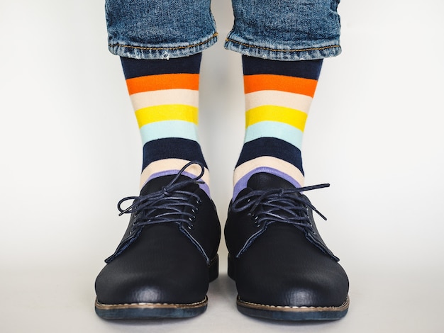 Men's legs, trendy shoes and bright socks