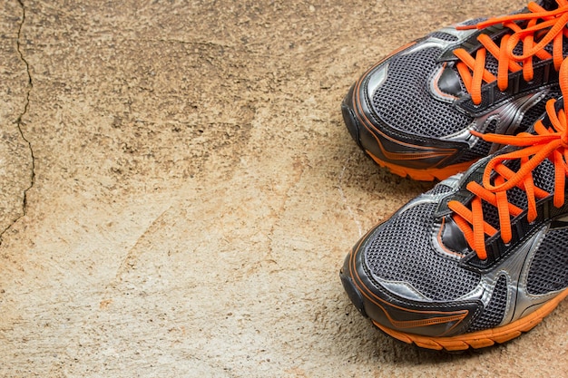 Men's running shoes on a street