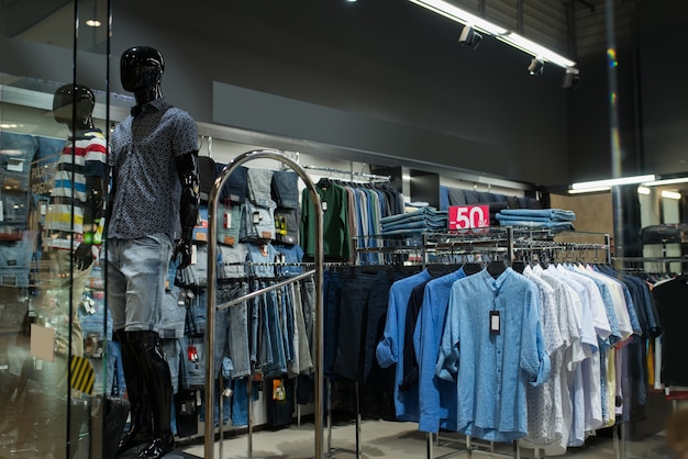 Men's summer clothes on a mannequin in a shopping mall