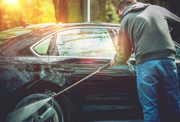 Men washing his car