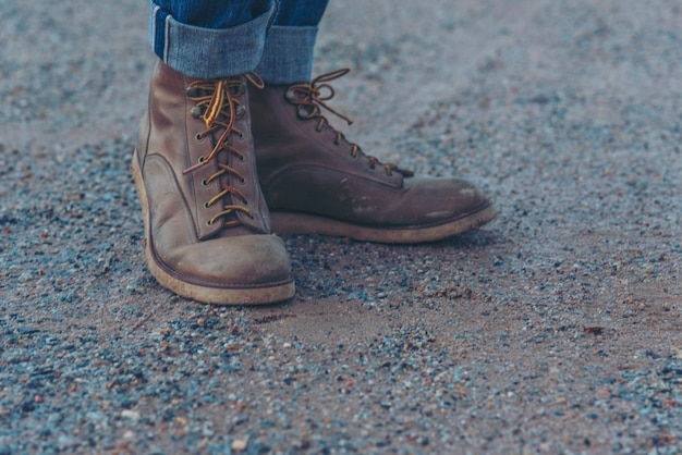 Men wear construction Boots safety footwear for worker at construction site