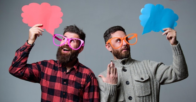 Men with beard and mustache mature hipster wear funny eyeglasses Explain humor concept Funny story and humor Comic idea Men joking Share opinion speech bubble copy space Comic and humor sense