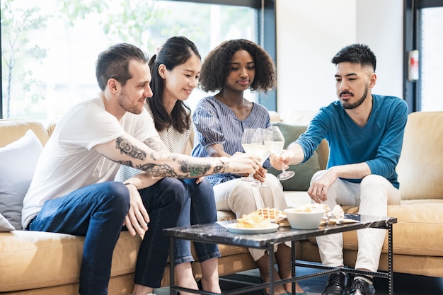 Men and women having a house party