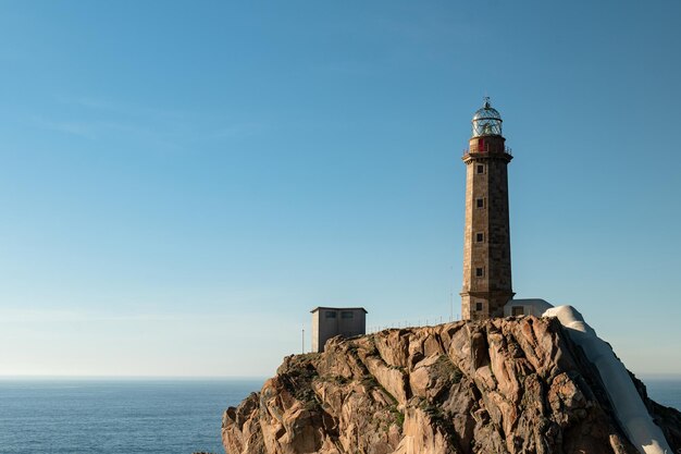 Foto mening van de vuurtoren in vilan kaap spanje