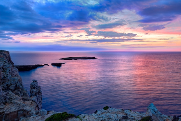 Menorca sunset in cap de caballeria cape at balearic