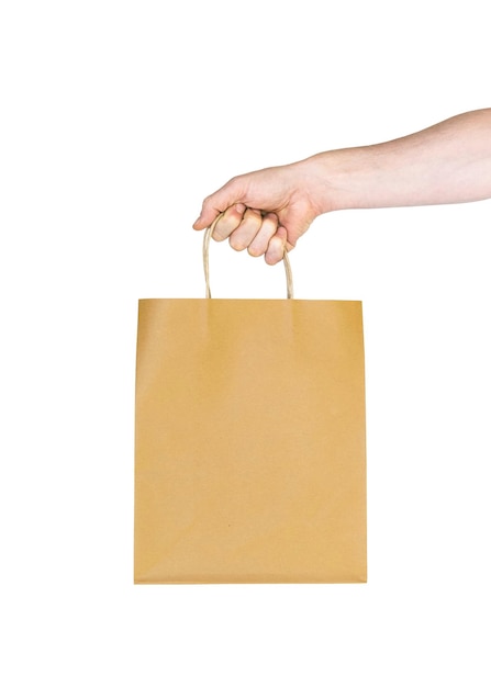 Photo mens hand holding paper shopping bag