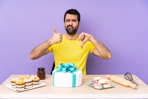 Mens in een lijst met een grote cake die goed-slecht teken maakt. Onbeslist tussen ja of niet