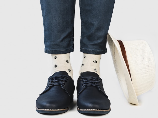 Mens legs, trendy shoes and bright socks.