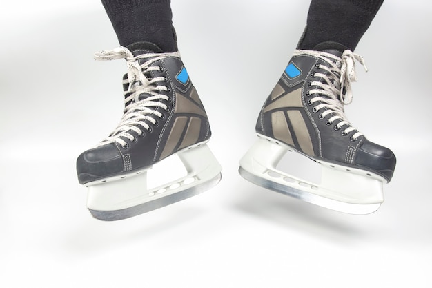 Mens skates for ice skating on white background