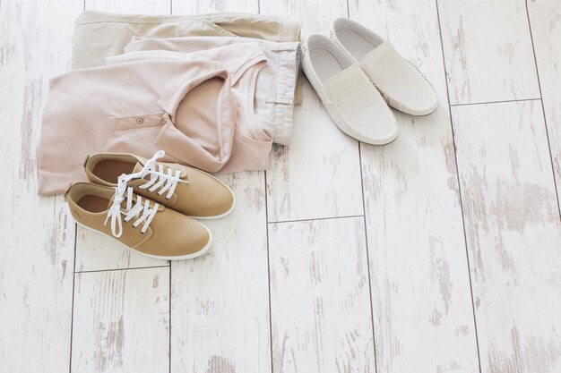 mens summer basic clothes and shoes on old wooden floor