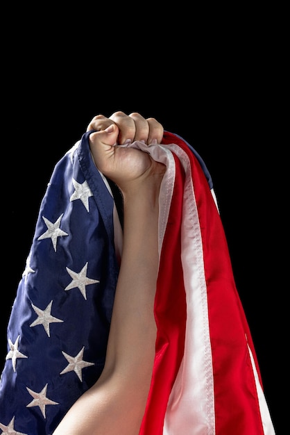 Menselijke hand met nationale amerikaanse vlag usa herdenkingsdag dag van de arbeid onafhankelijkheidsdag publiek