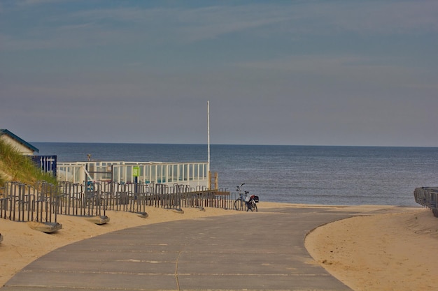 Foto mensen op het strand tegen de lucht