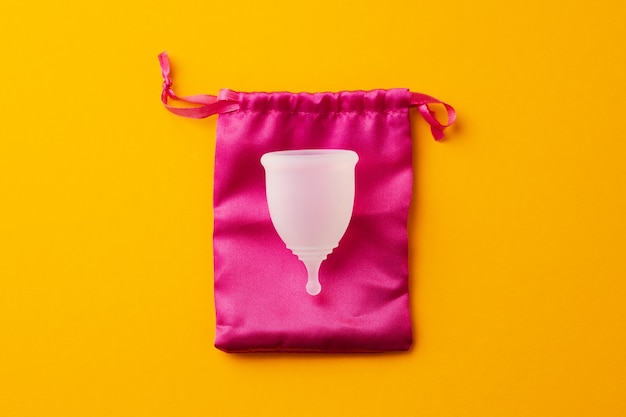 Menstrual cup and it's case close up