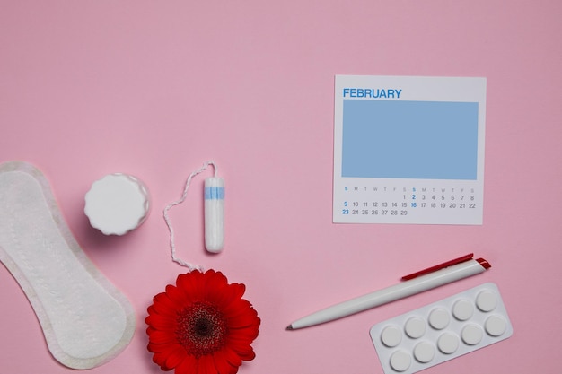 Menstrual sanitary tampons pads and red flower