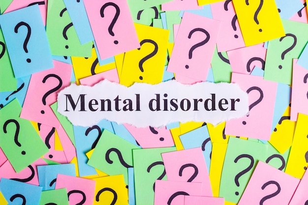 Photo mental disorder syndrome text on colorful sticky notes