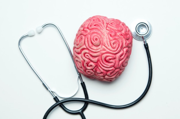 Photo mental health concept brain with a stethoscope