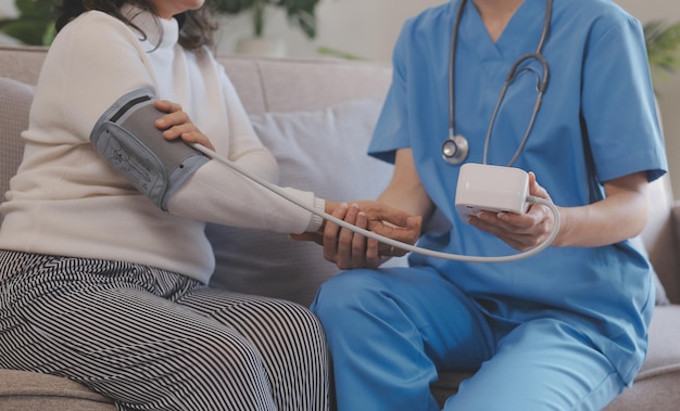 Mental health counselor Young woman during therapy session talking with a psychologist in the office