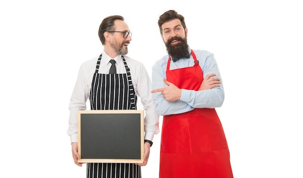 Menu planning happy chef team in apron bearded men with blackboard copy space catering business welcome on board cafe and restaurant opening partners celebrate start up best chef team ever