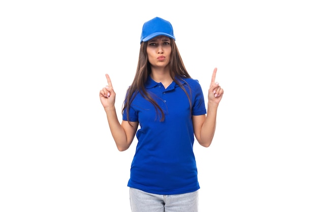 Merch concept smiling young woman in blue cotton tshirt and cap with print space