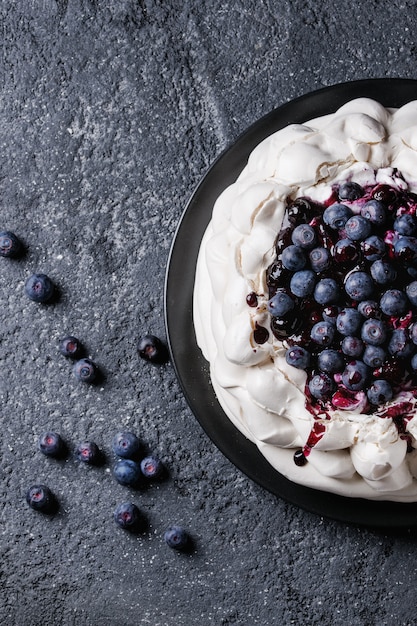 Meringue cake Pavlova with blueberries
