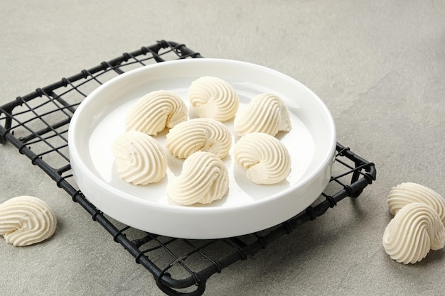 Meringue cookies in white bowl made from whipped flour with sugar and eggs