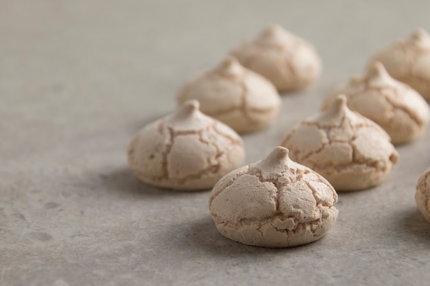 Photo meringues on a beige table