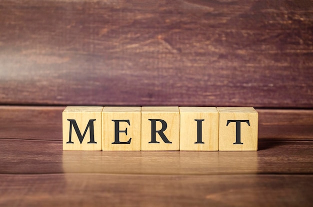 Merit symbol Wooden cubes with the word merit