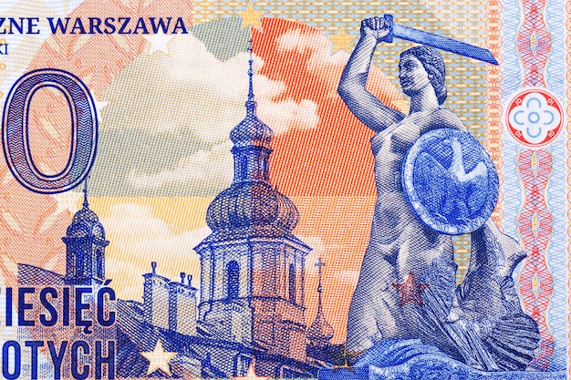 Памятник русалке в Варшаве из денег