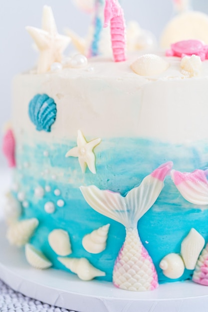 Photo mermaid themed layer vanilla cake